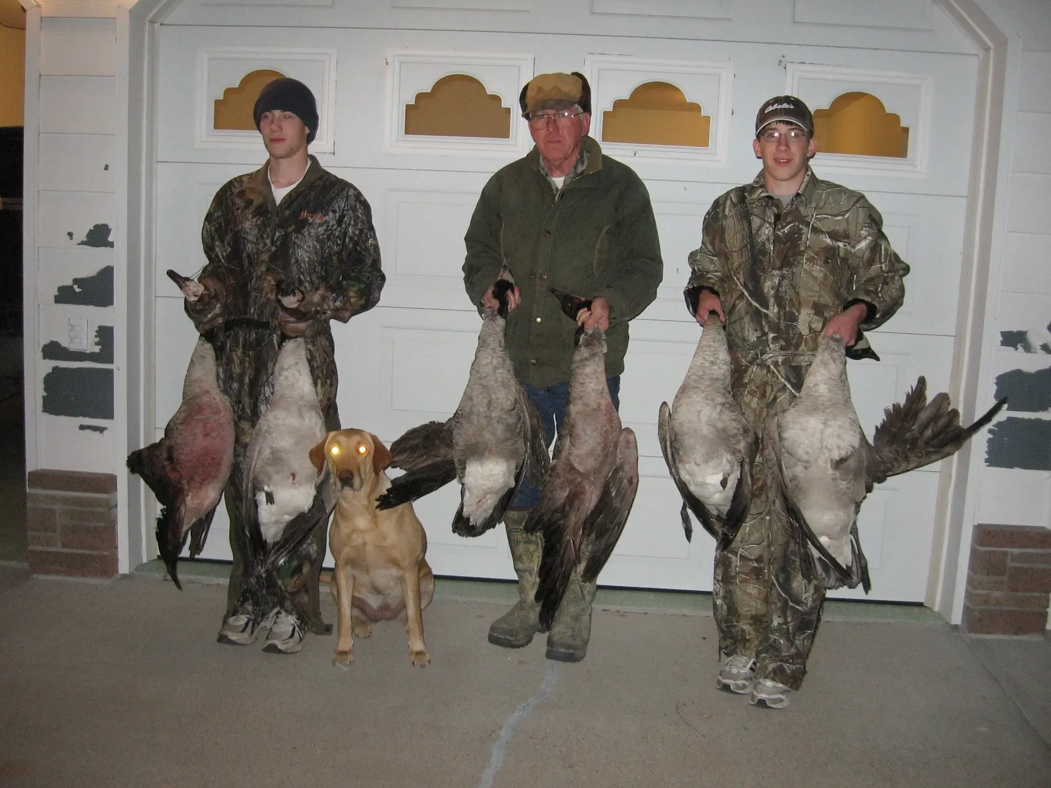 Dan, his brother Marcus, and Grandfather after a succesful goose hunt in Nebraska