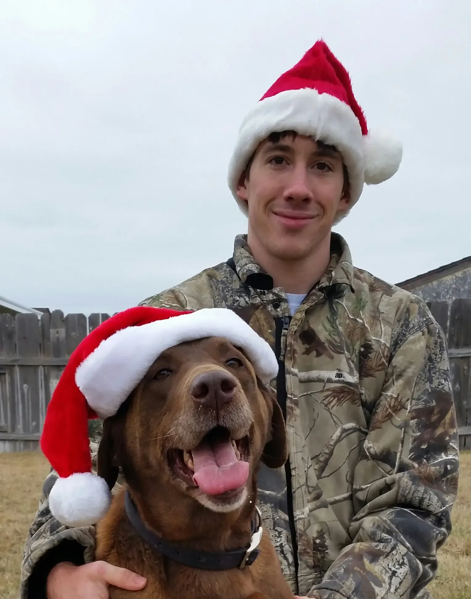 Marcus with his dog Ginger during Christmas break
